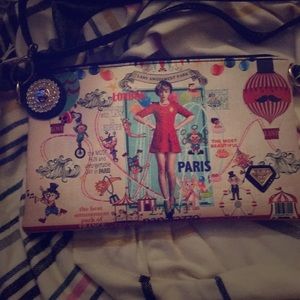 Clutch/over the shoulder purse. LANY amusement